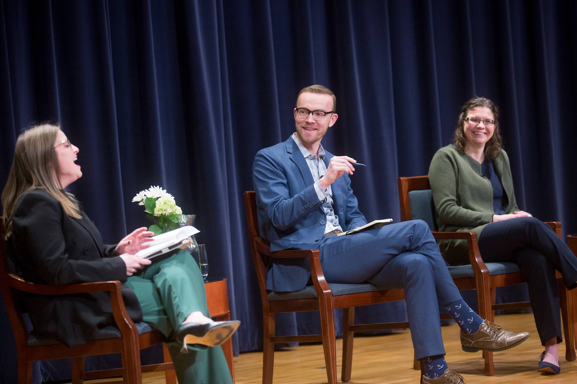 three man standing together smiling